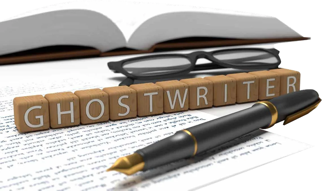 Ghostwriter letter blocks beside a fountain pen, glasses, and open manuscript pages